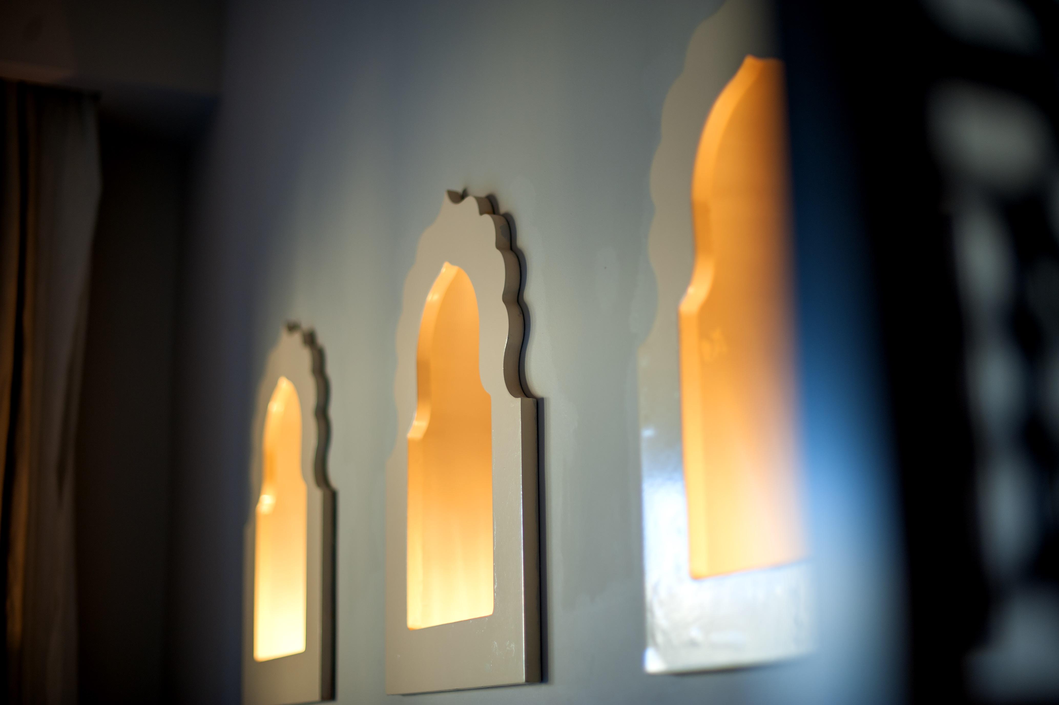 Sunrise Arabian Beach Resort Sharm El-Sheikh Exterior foto A set of three windows in the wall of a house